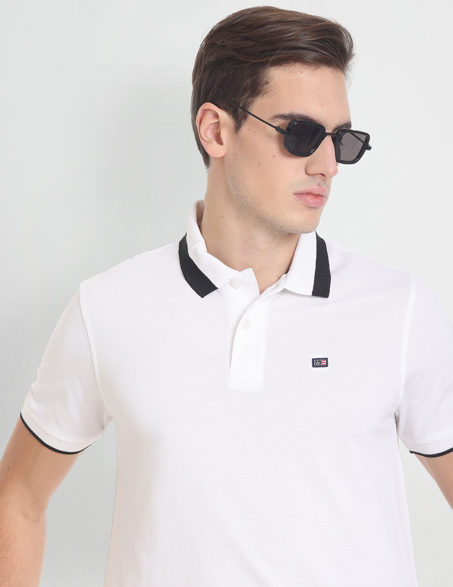 Arrow Sports Striped Collar Solid Pique Polo Shirt
