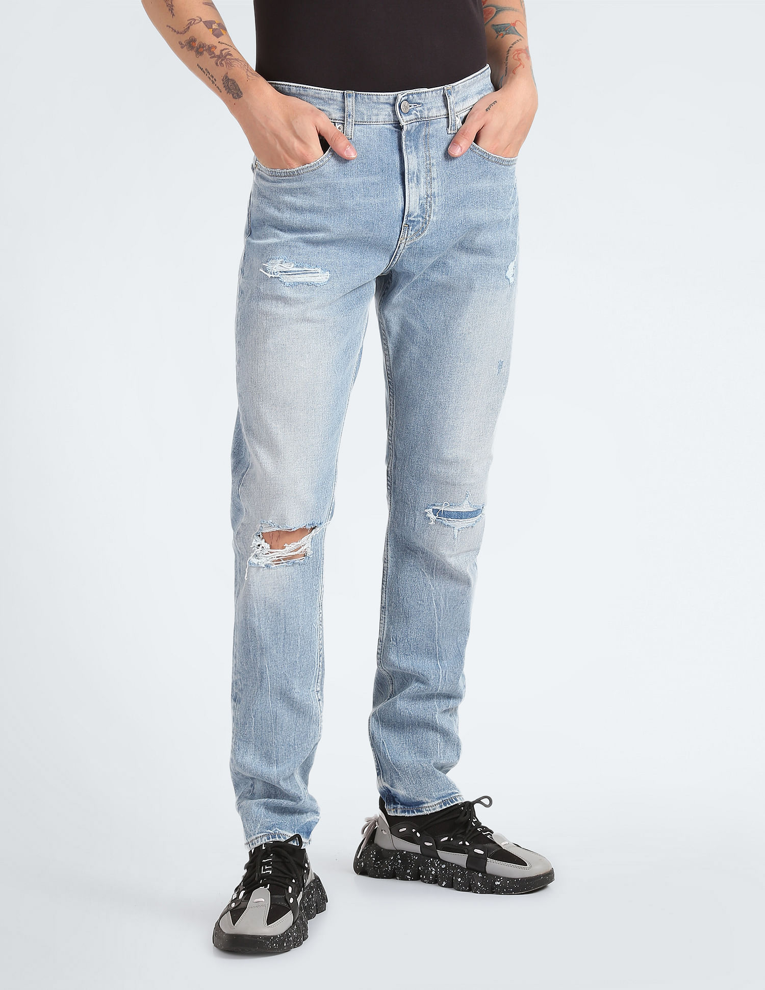 Ripped slim taper fit store jeans