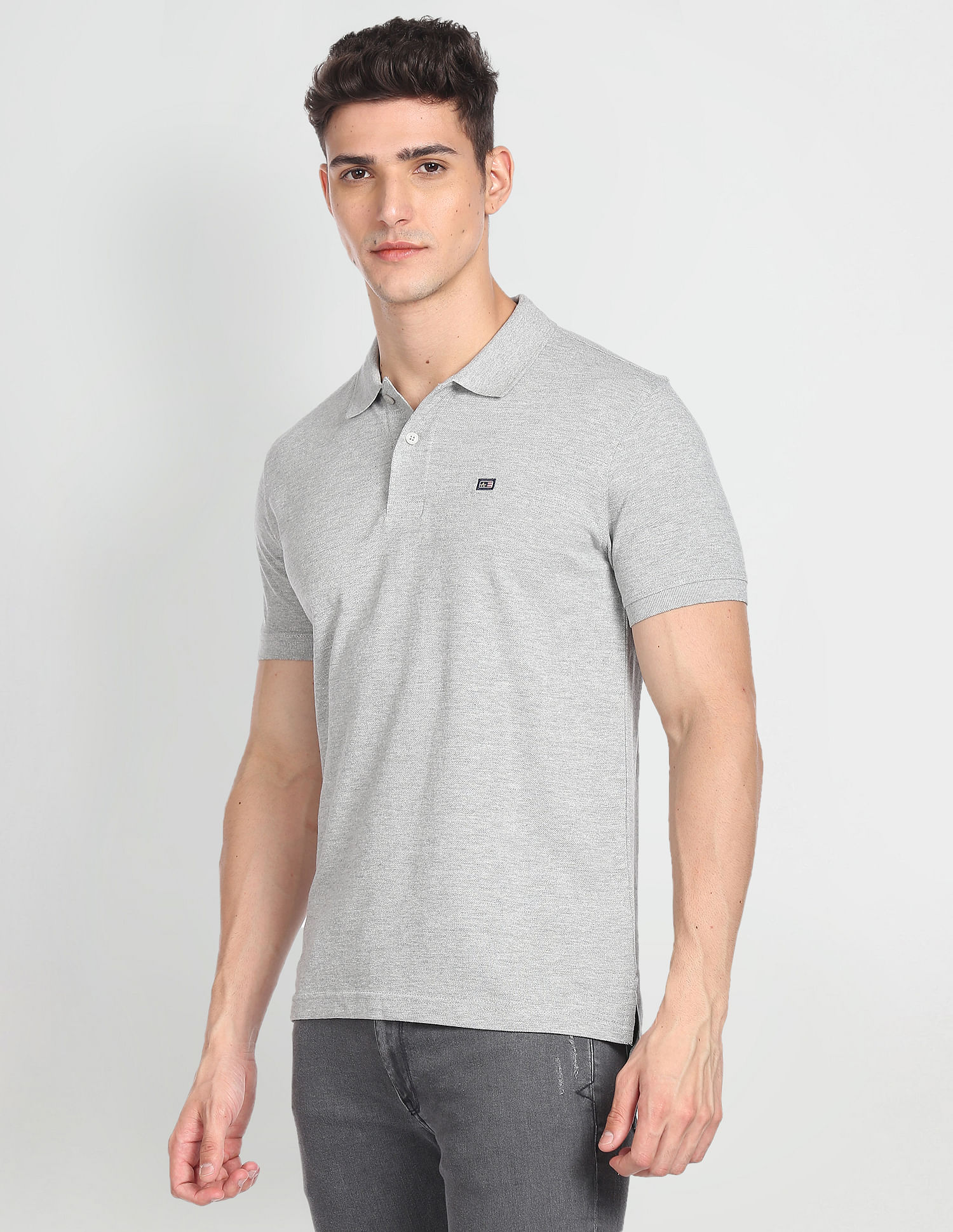 Arrow Sports Ribbed Cuff Heathered Polo Shirt