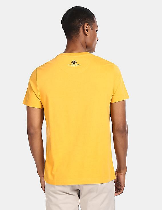 yellow branded t shirt