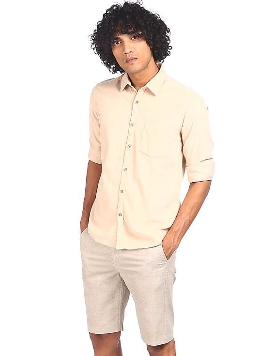 beige shirt with khaki pants