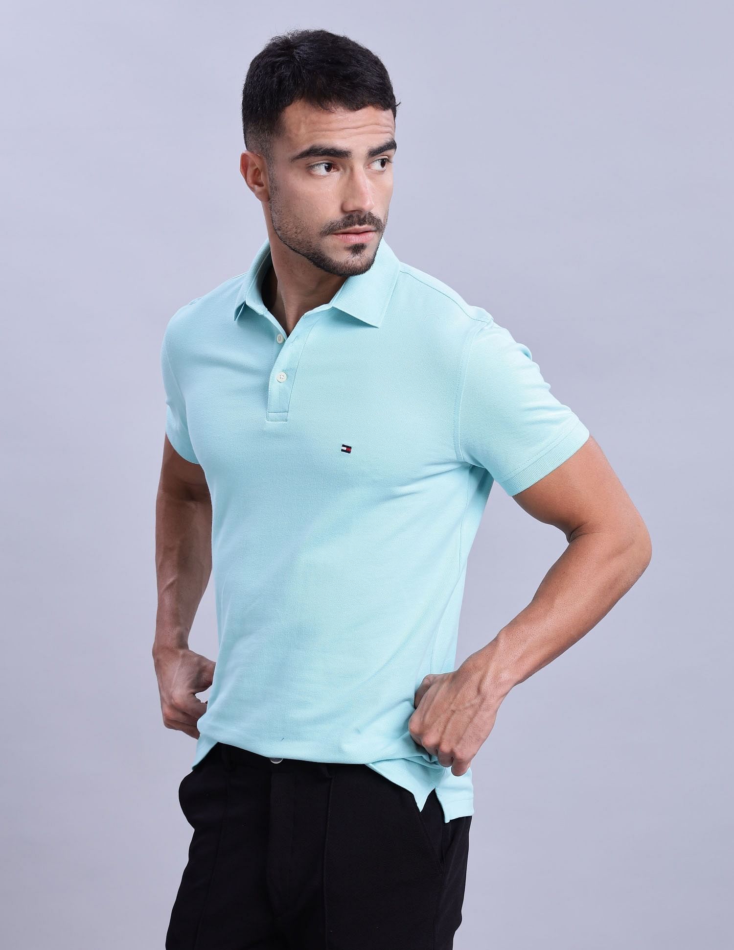 Tommy Hilfiger Mens Blue Solid Polo Shirt