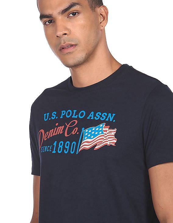 Buy online Round Neck Printed T-shirt from top wear for Men by U.s.polo  Denim for ₹909 at 30% off | 2024 Limeroad.com