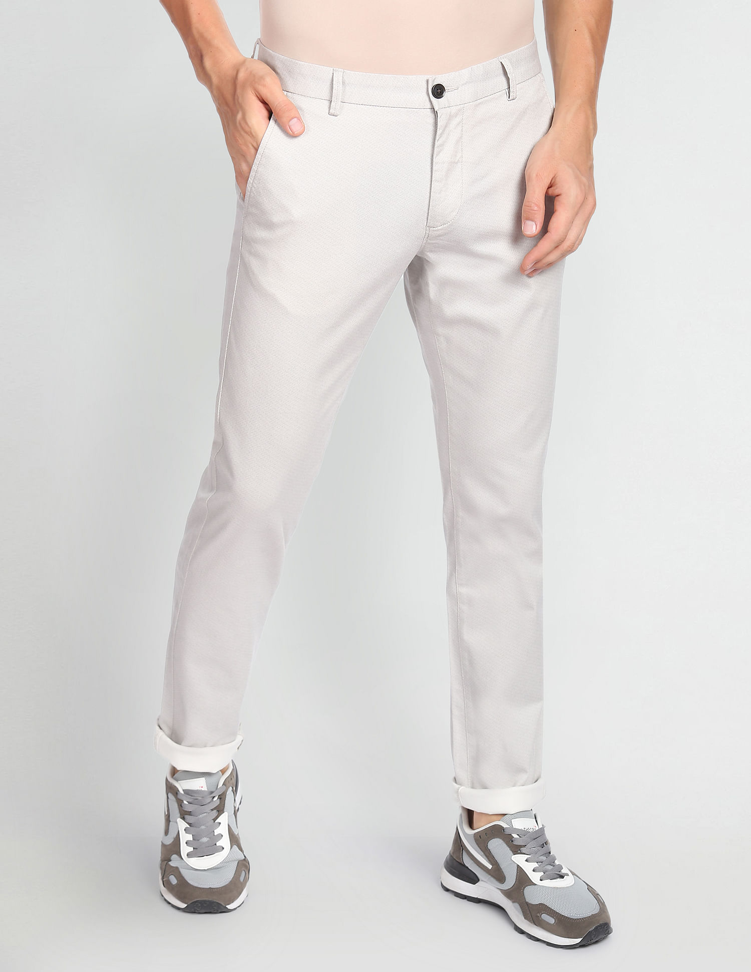 Buy Arrow Sports Men Light Khaki Low Rise Solid Bronson Slim Fit Casual  Trousers  NNNOWcom