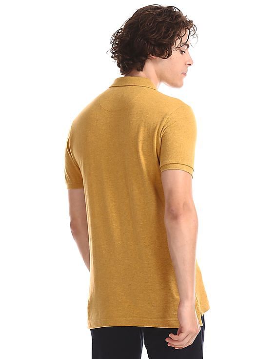 Buy Men Yellow Brand Print Polo Shirt online at NNNOW.com