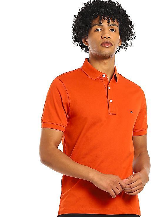 Buy Tommy Hilfiger Men Orange Slim Fit Solid Polo Shirt NNNOW