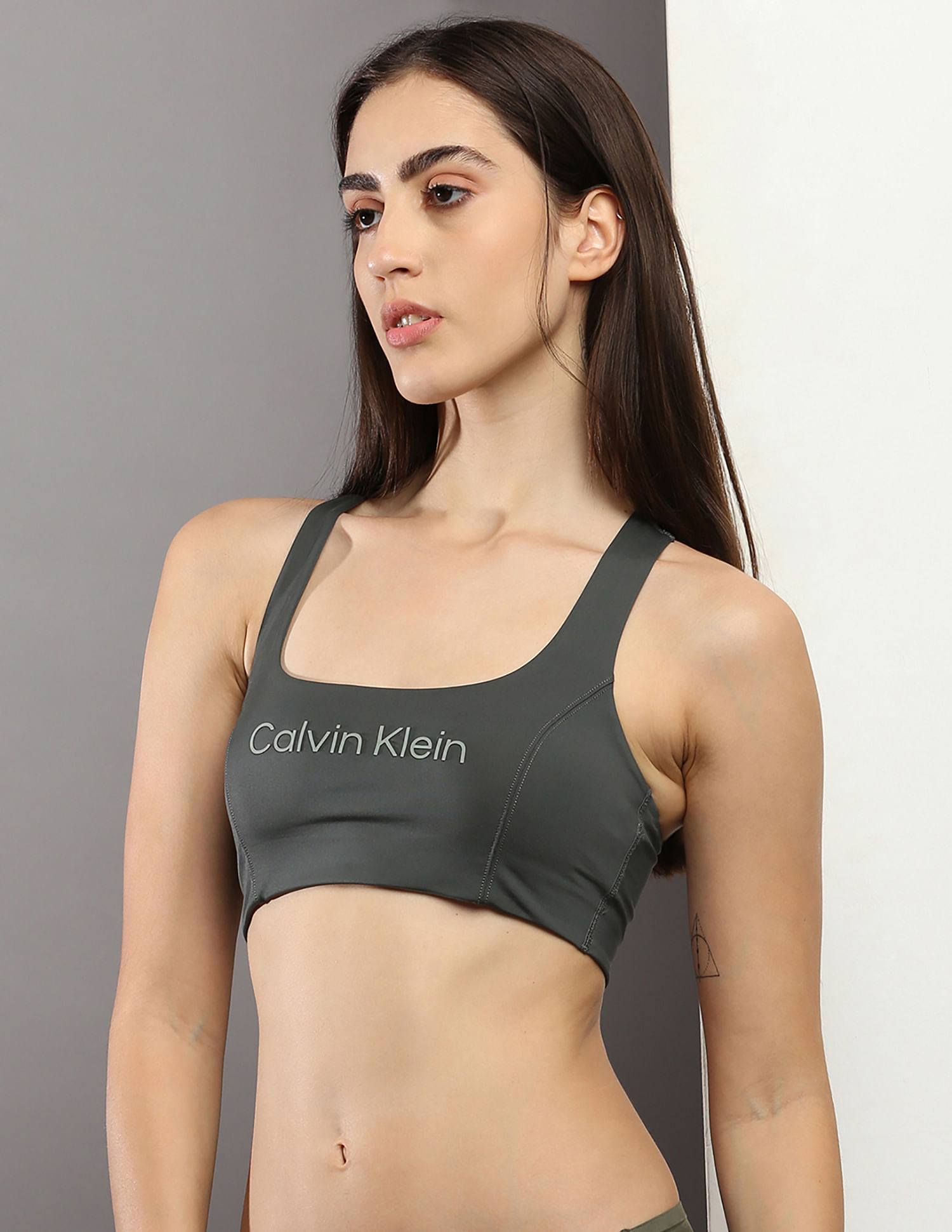 Buy Calvin Klein Logo Waistband Medium Support Sports Bra In Grey