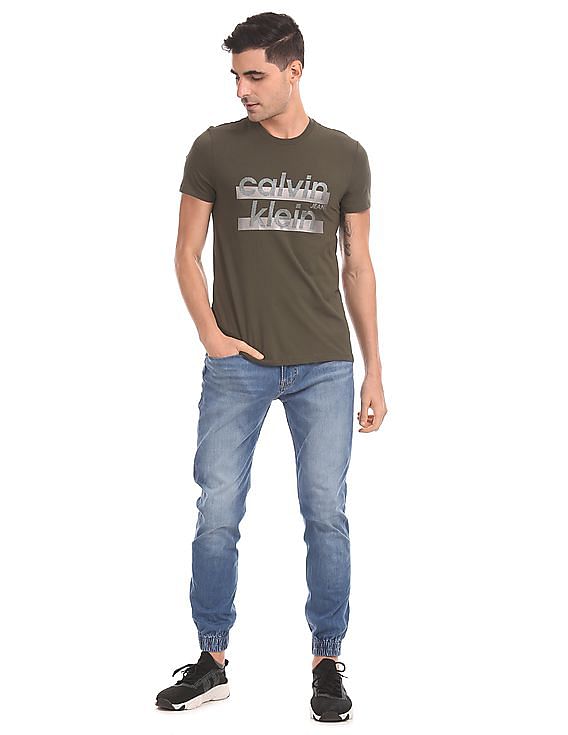 Calvin Klein Men Blue Stone Wash Four-Way Stretch Jogger Jeans