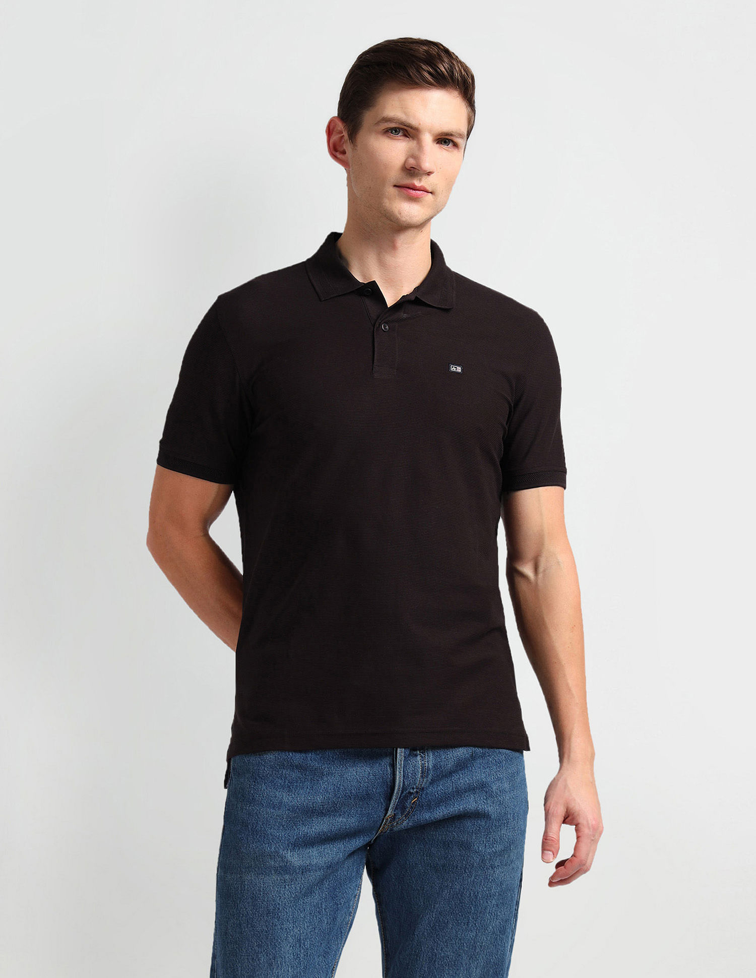 Arrow Sports Ribbed Collar Solid Polo Shirt