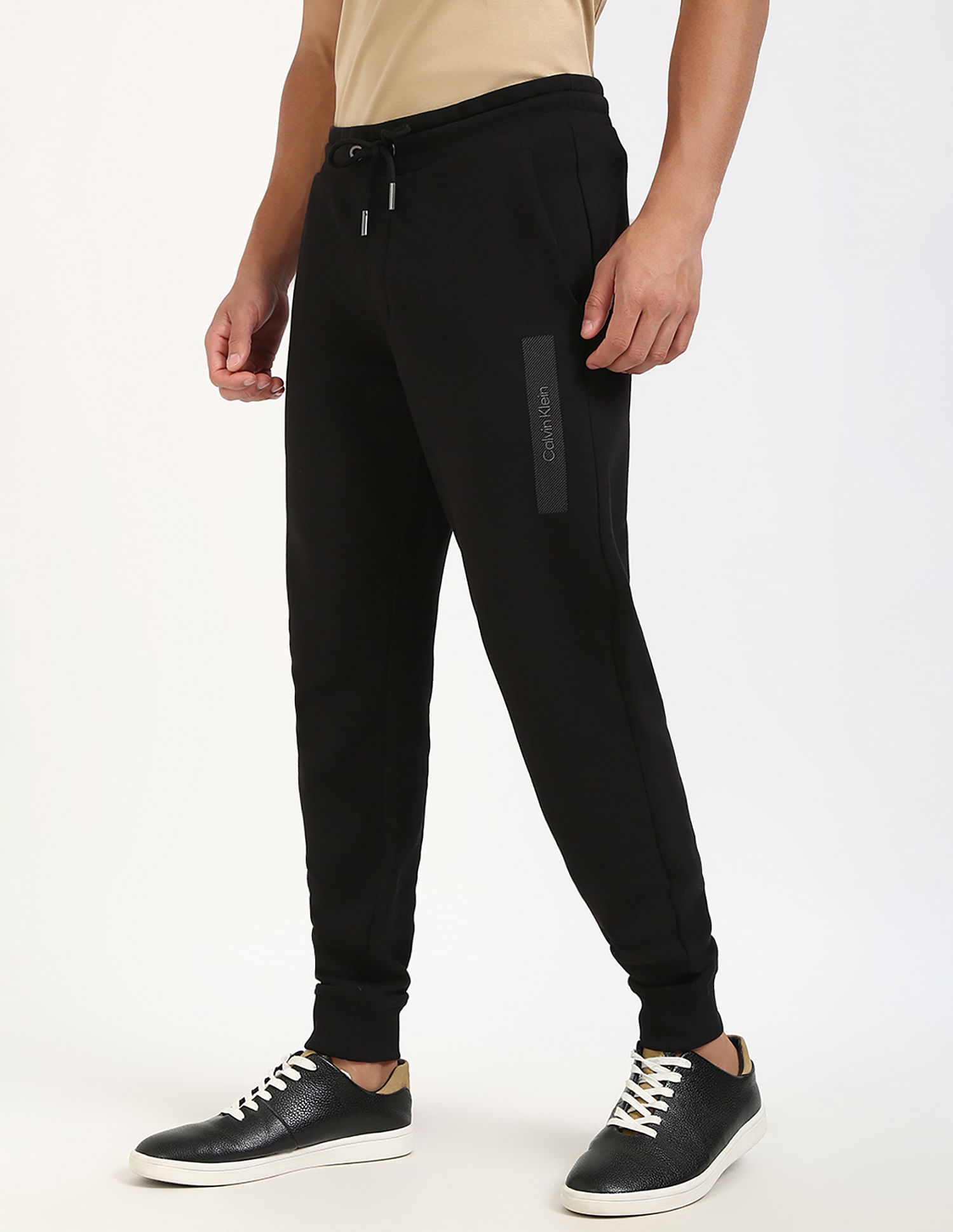 Calvin Klein Jeans Regular-Fit Solid Mid Rise Trouser