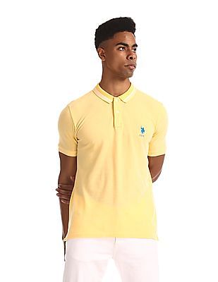 pale yellow polo shirt