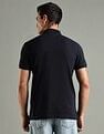 Tommy Hilfiger Solid Regular Fit Cotton Polo T-Shirt