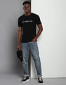 Calvin Klein Stone Wash Body Tapered Jeans