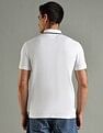 Tommy Hilfiger Solid Regular Fit Cotton Polo T-Shirt