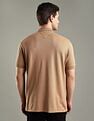 Tommy Hilfiger Solid Regular-Fit Cotton Polo Shirt
