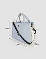 Tommy Hilfiger Solid Blue PU Hand Bags